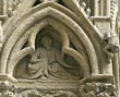Panel 10:06 - Seated youthful figure in long robe
